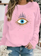 Women's autumn and winter casual fashion loose and comfortable warm eye pattern printed round neck long sleeved pullover
