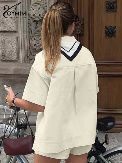 Oymimi Fashion Beige 2 Piece Sets Woman Outfit Elegant Lapel Short Sleeve Pockets Side Slit Shirts And High Waisted Shorts Sets