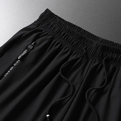 Men's Summer Ice Silk Pants Mesh Quick drying Ankle-banded Breathable Casual Thin Pants Loose Elastic Pants Sports Trousers