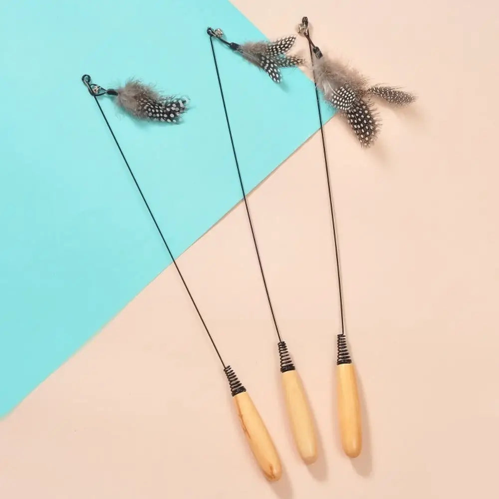 Wooden Handle Spring Teasing Cat Stick Feather Simulation Fishing Rod Cat Teaser Stick Interactive Replaceable Bell Squeaky Cat