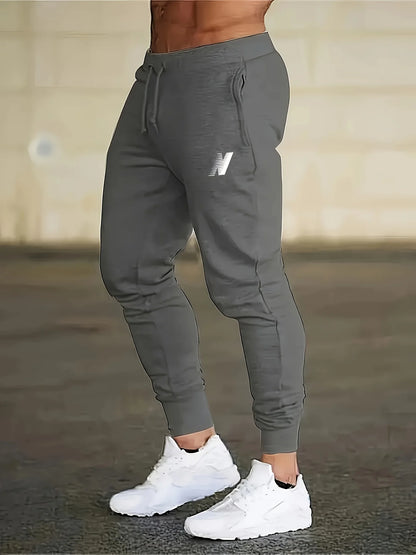 26Men's Casual Fitness Joggers Elastic Waist Lightweight Knit Fabric Comfortable Stretch Design Running Training Sports Pants
