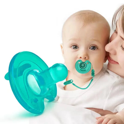 Newborn baby lulls to sleep with a breast milk like pacifier, with a soft silicone pacifier and round head to prevent eating