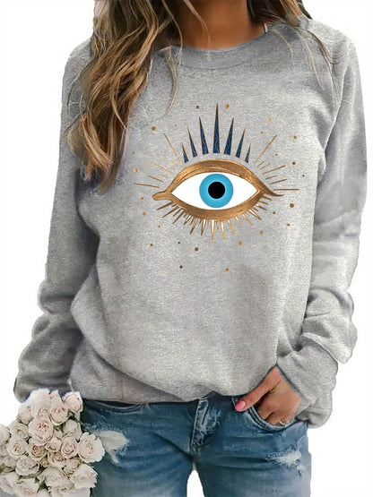 Women's autumn and winter casual fashion loose and comfortable warm eye pattern printed round neck long sleeved pullover
