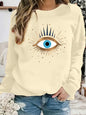 Women's autumn and winter casual fashion loose and comfortable warm eye pattern printed round neck long sleeved pullover